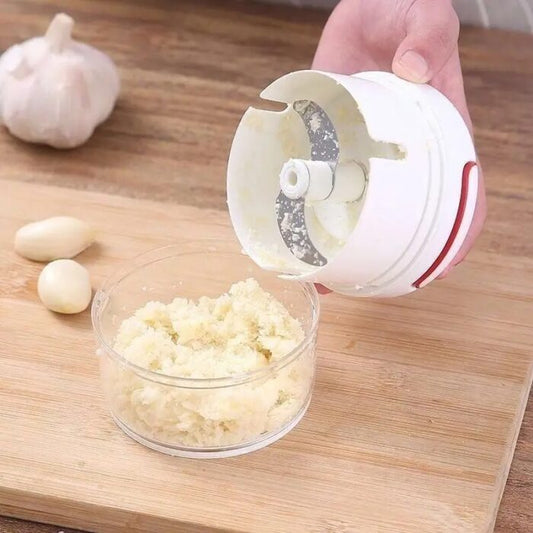 Mini hand pull food chopper for chopping garlic, onions, ginger, nuts and vegetables quickly without electricity