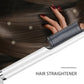 909 hair straightener comb creating smooth, straight, and frizz-free hair.