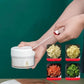 Portable hand pull food processor for chopping garlic, herbs, vegetables and spices with sharp stainless steel blades