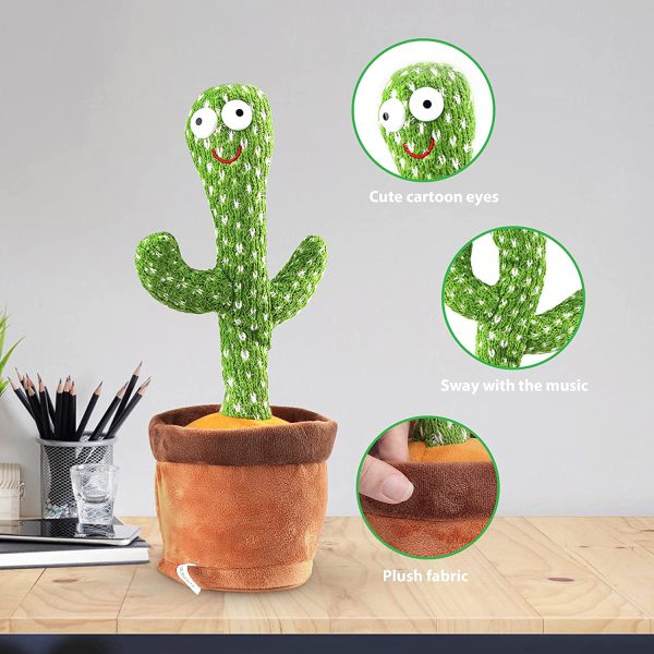Plush cactus toy with cartoon eyes on a desk, featuring close-up details.