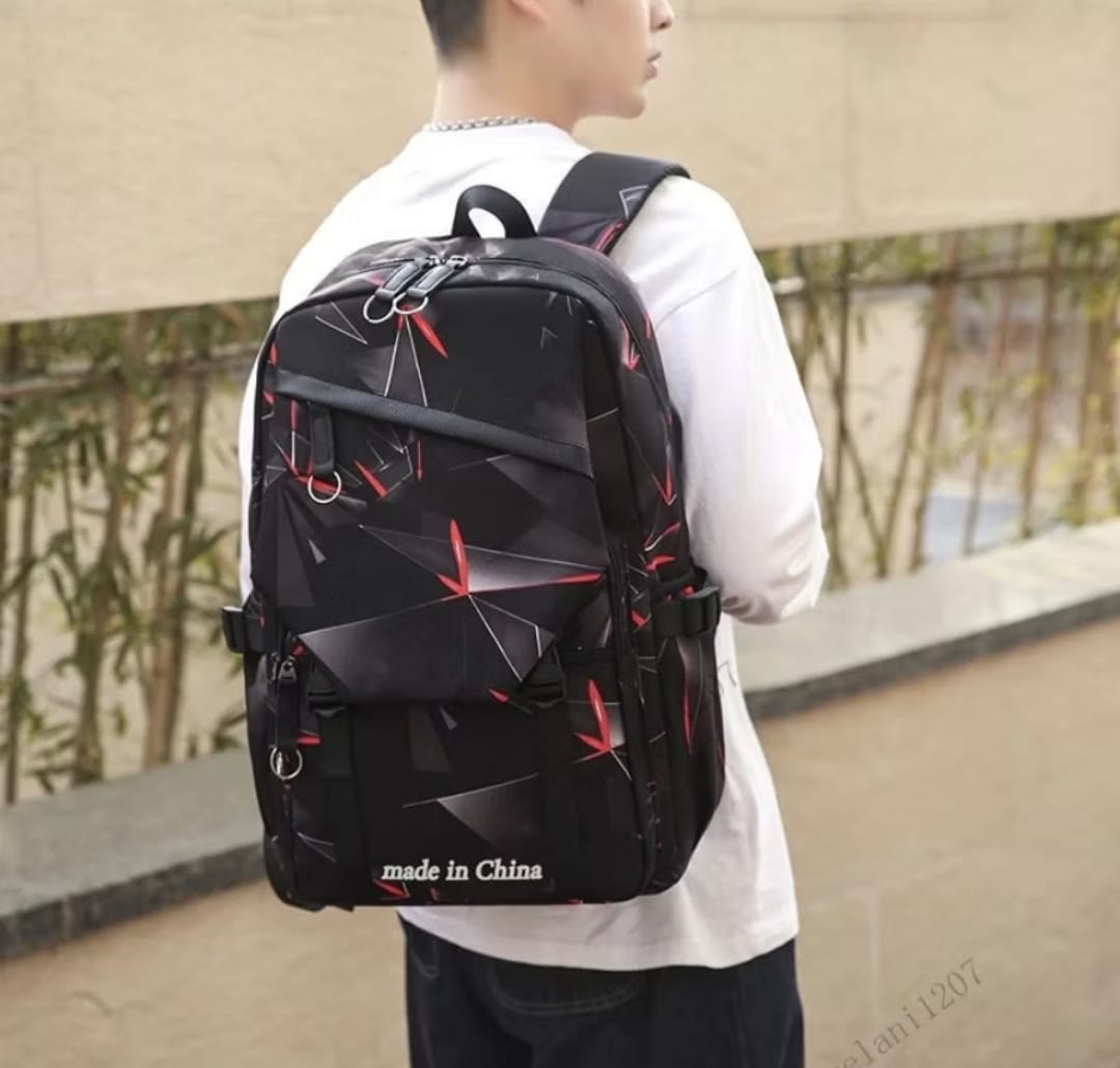 Black geometric backpack back view with padded shoulder straps for travel and everyday use