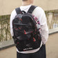 Black geometric laptop backpack with multiple storage compartments for school travel and work