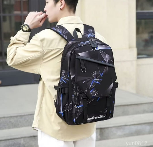 Black geometric travel backpack for men with multiple compartments and adjustable shoulder straps