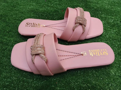 Pink women's flat sandals with stylish buckle design and comfortable sole